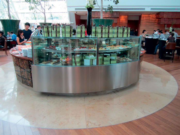 curved glass cabinet with cafe food