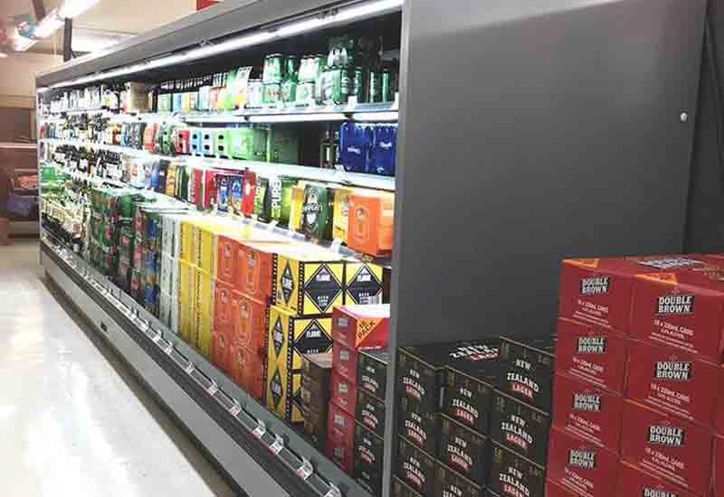 beer fridge open front multideck in supermarket