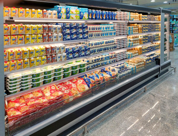 chilled aisle of supermarket with chiller items on display